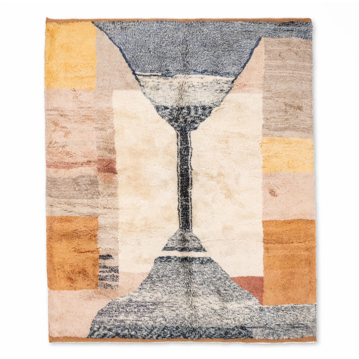 Abstract Moroccan wool rug with earthy tones, handmade by artisans. Perfect boho aesthetic for living room or creative spaces.