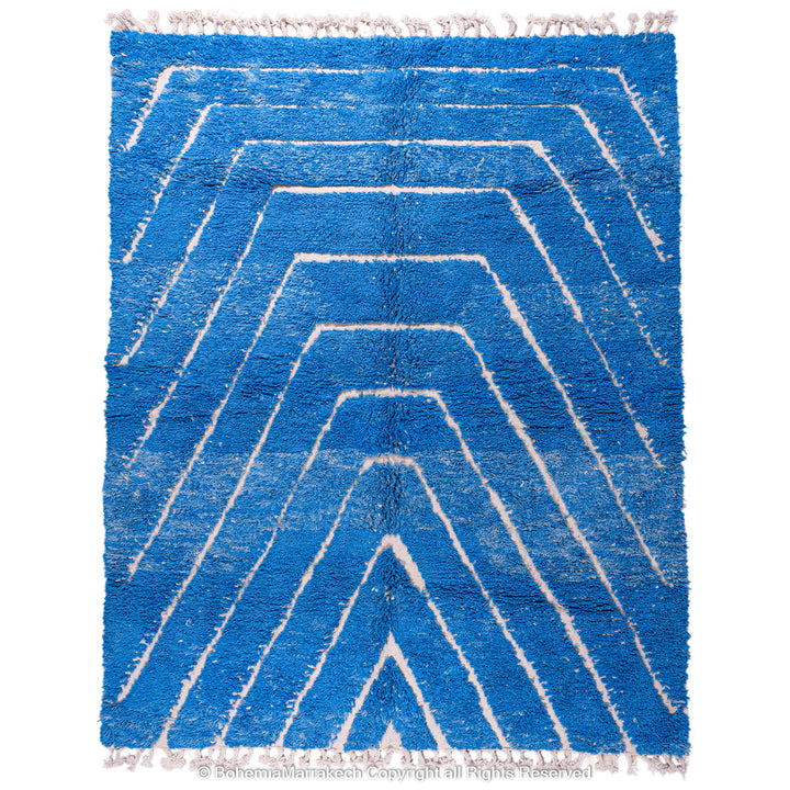 Multicolored Moroccan Boujaad Rug handmade with wool, featuring vibrant pink, yellow, and blue Berber patterns.
