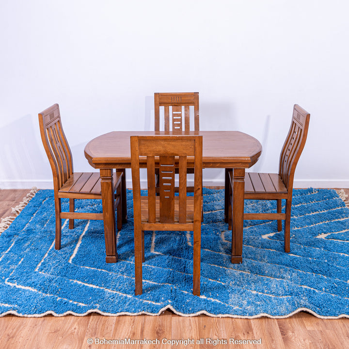 Multicolored Moroccan Boujaad Rug handmade with wool, featuring vibrant pink, yellow, and blue Berber patterns.