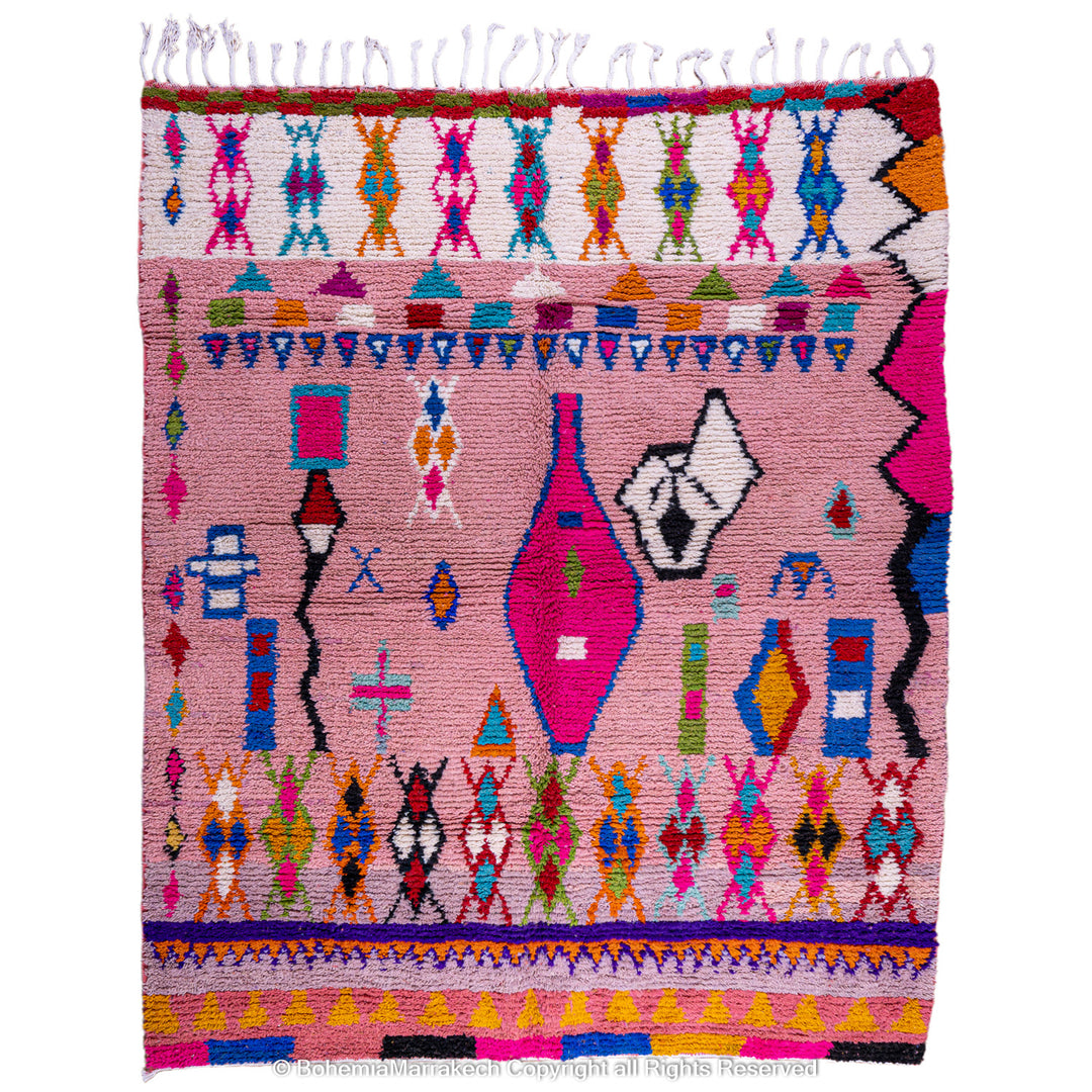 Handmade pink Boujaad Moroccan rug with colorful tribal and diamond motifs on wool