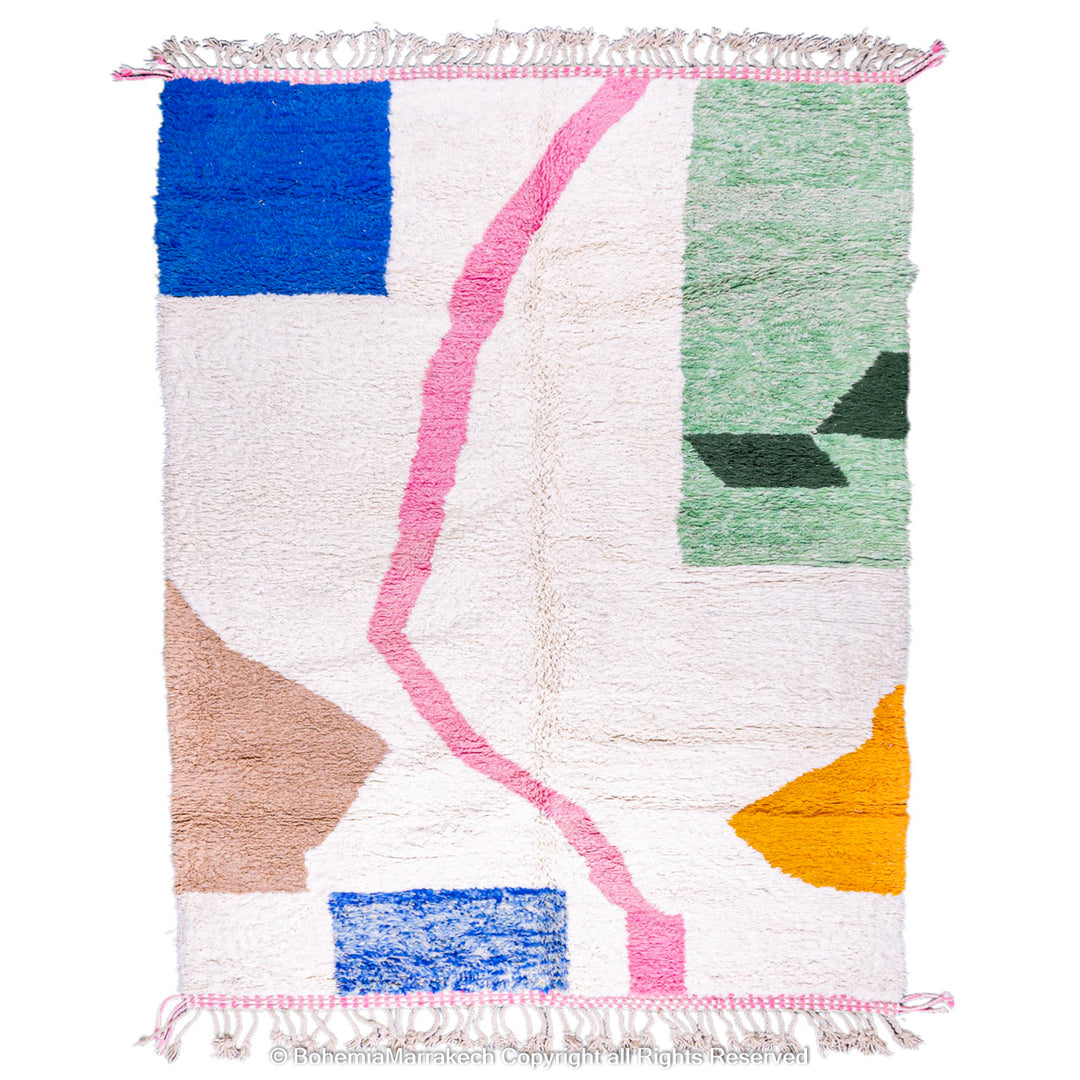 Colorful handmade Moroccan wool rug with abstract geometric design in blue, green, yellow, pink on ivory shag base.