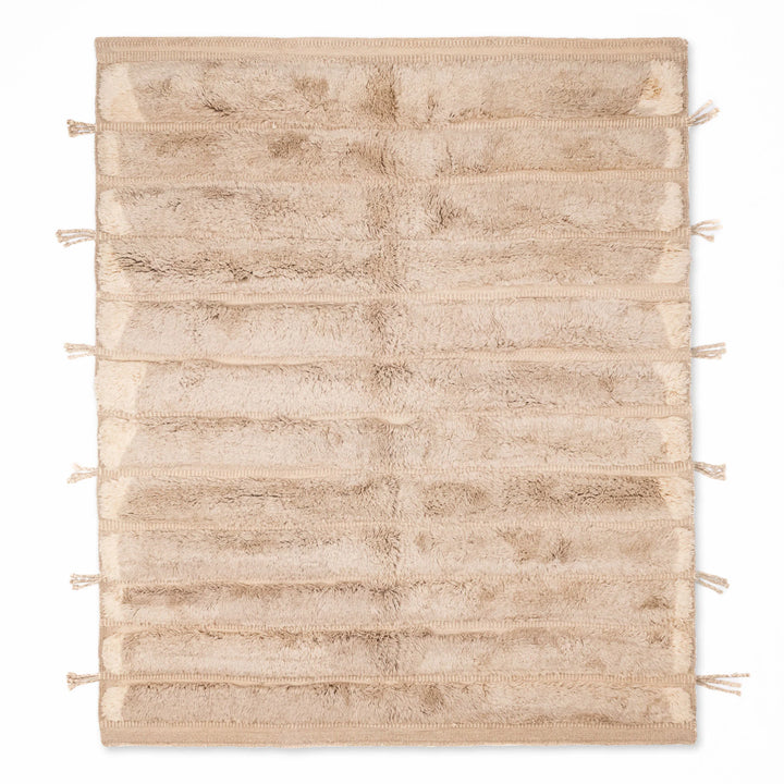 Beige Moroccan wool rug, handwoven Berber shag style, traditional Moroccan carpet perfect for modern home decor.