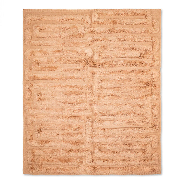 Handmade Moroccan wool rug in abstract design, featuring shades of pink, teal, and ochre, perfect for cozy living spaces.