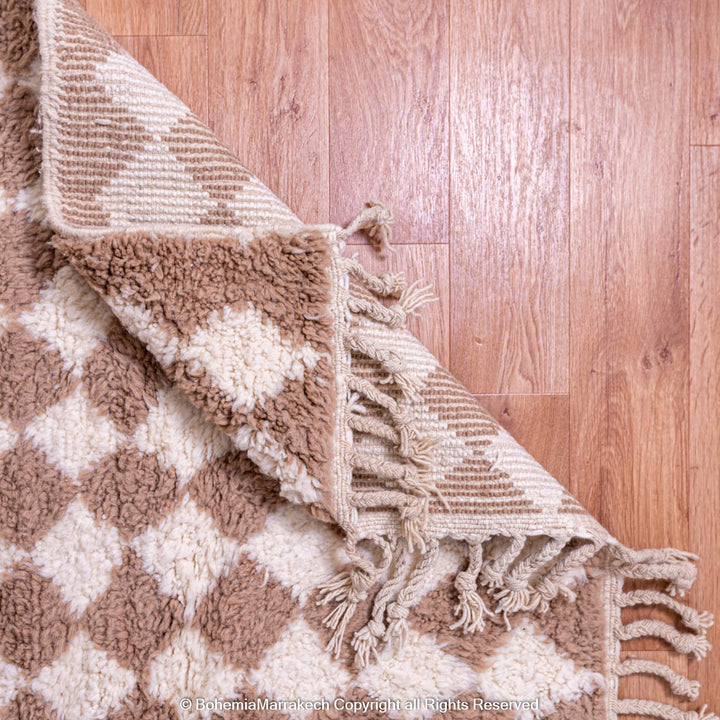 Handmade Moroccan rug with brown and white diamond pattern – wool area rug