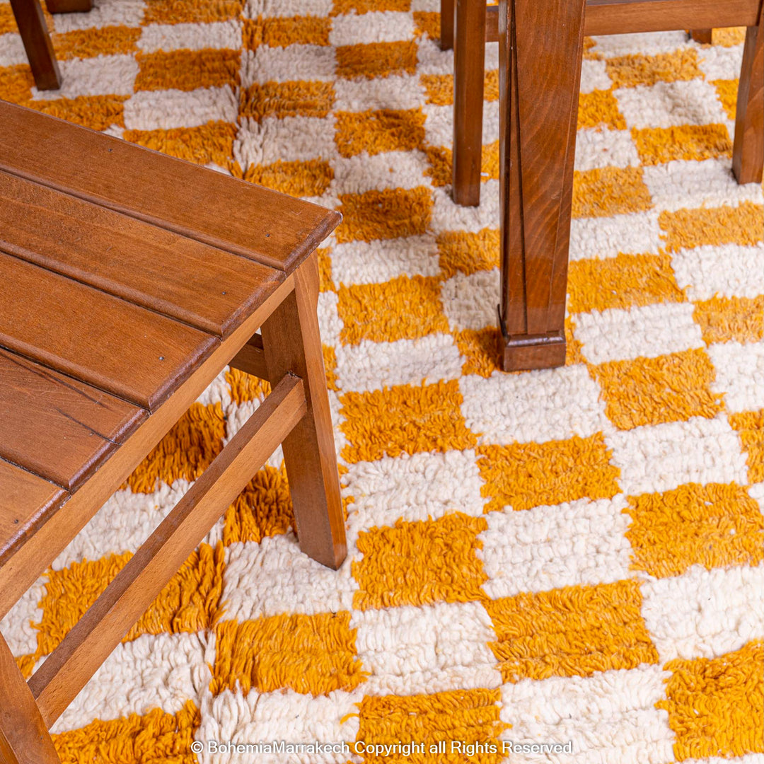 Handmade Moroccan rug with orange and white checkerboard pattern – wool area rug