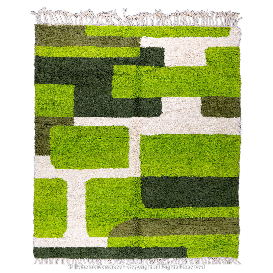 Handmade green geometric Moroccan wool rug with modern pattern