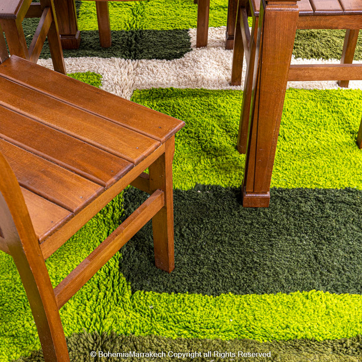 Handmade green geometric Moroccan wool rug with modern pattern