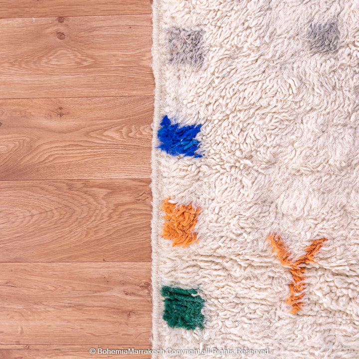 Minimalist Moroccan wool rug with tribal Berber design in natural tones