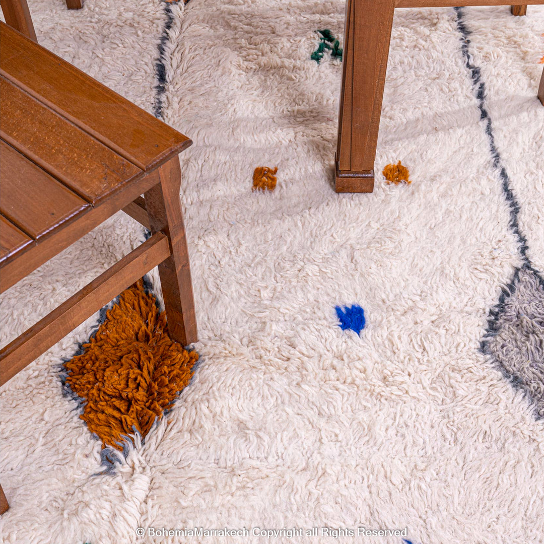 Minimalist Moroccan wool rug with tribal Berber design in natural tones