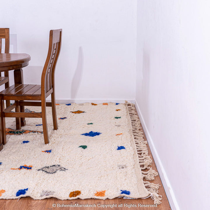 Minimalist Moroccan wool rug with tribal Berber design in natural tones