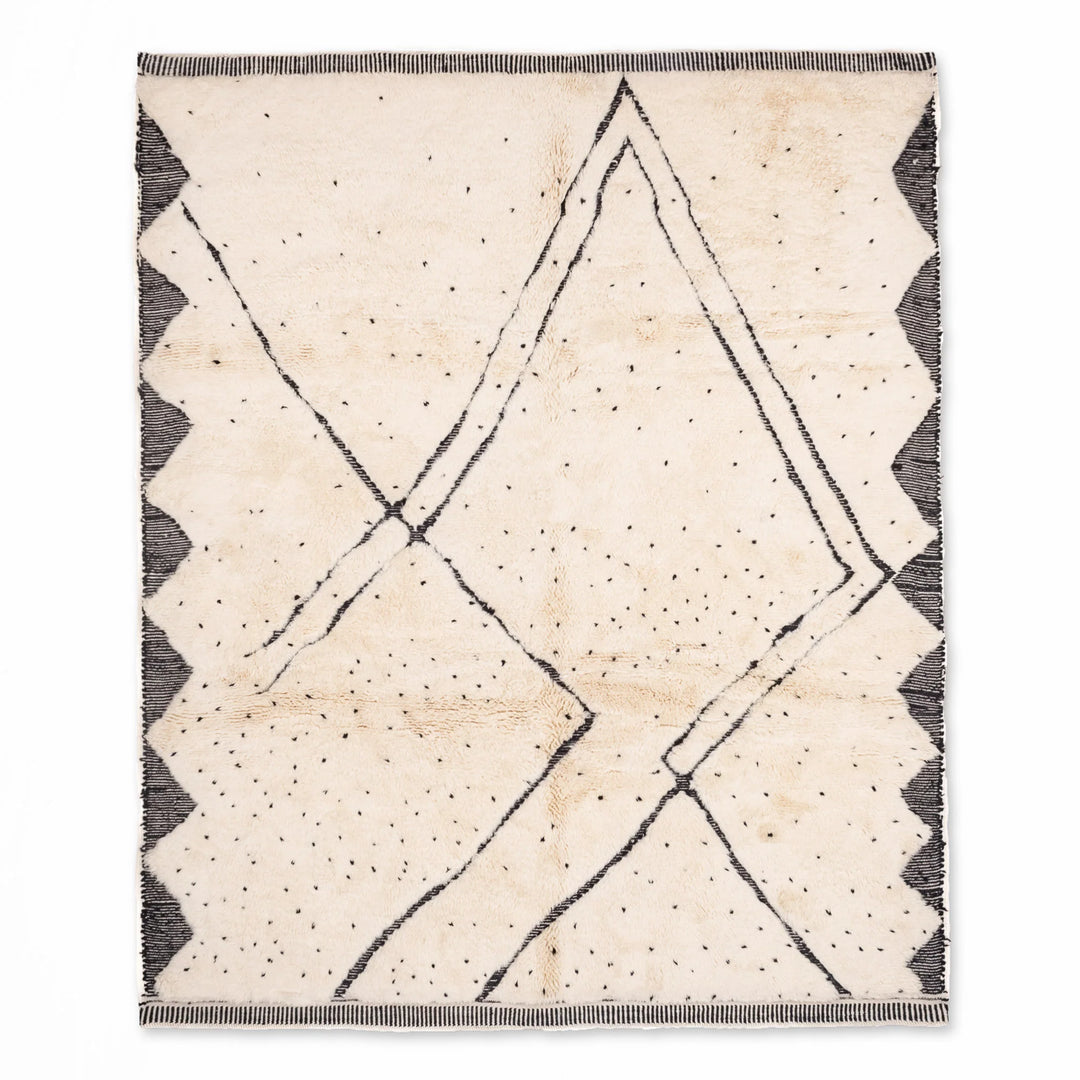 Beni Ourain Moroccan rug with diamond and dotted pattern, tribal Berber design, handwoven wool area rug for modern interiors.