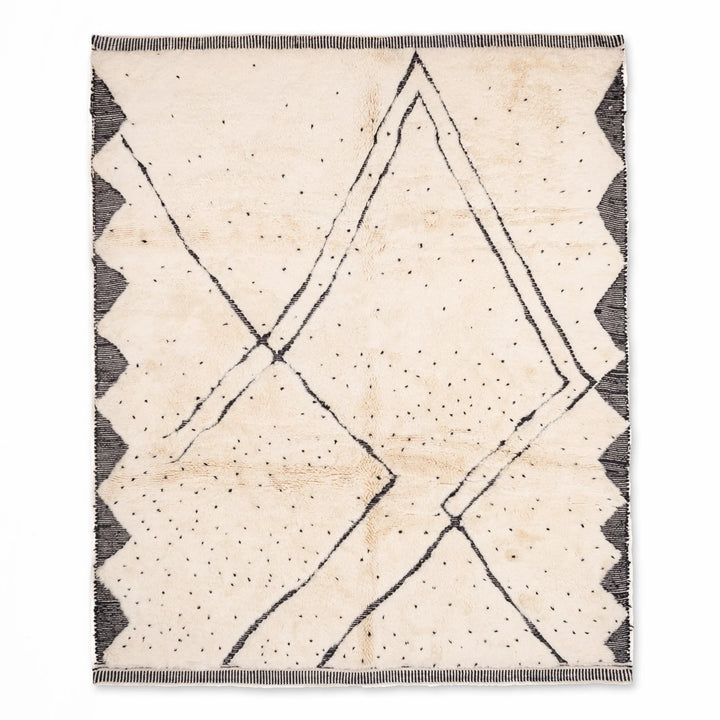 Beni Ourain Moroccan rug with diamond and dotted pattern, tribal Berber design, handwoven wool area rug for modern interiors.