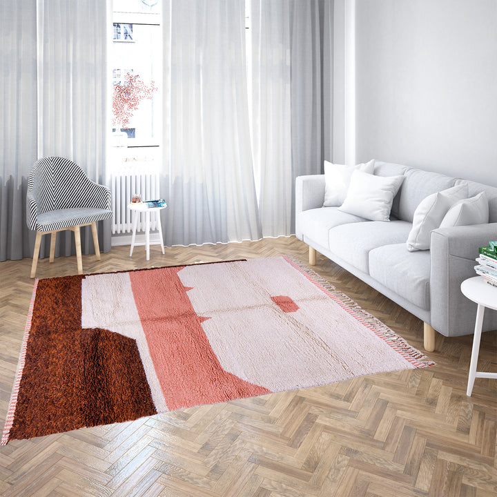 Desert-inspired Moroccan rug with earthy red and brown abstract mountain motifs, handmade from 100% wool