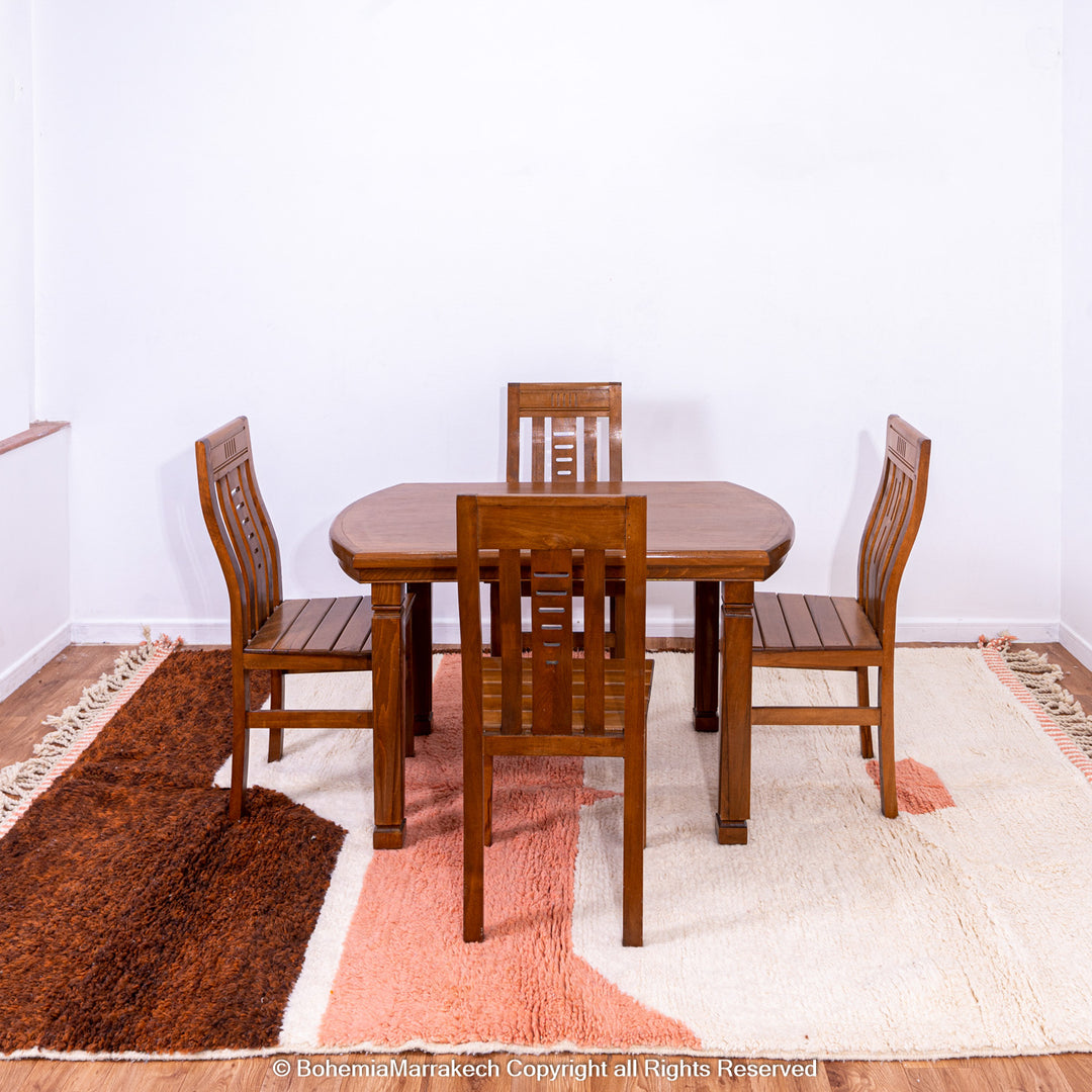 Desert-inspired Moroccan rug with earthy red and brown abstract mountain motifs, handmade from 100% wool