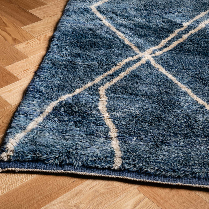 Blue Moroccan Beni Mrirt Rug with ivory geometric lines, handwoven wool, ideal for contemporary decor. Moroccan rug, 8 x 10.