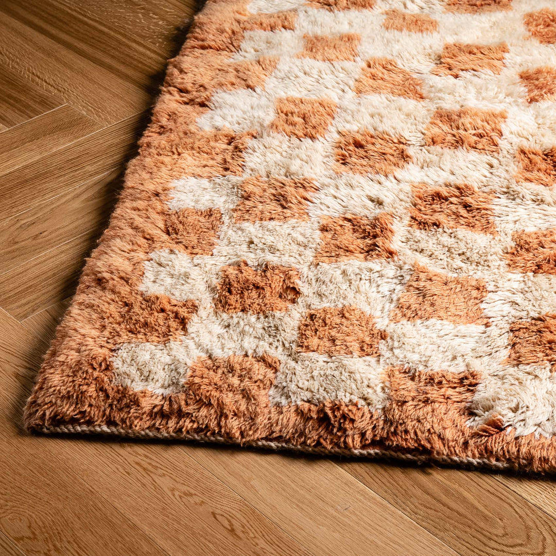 Checkered Moroccan wool rug, handmade Beni Mrirt carpet with shag finish, blending traditional Berber and modern design. Rugs from Morocco.