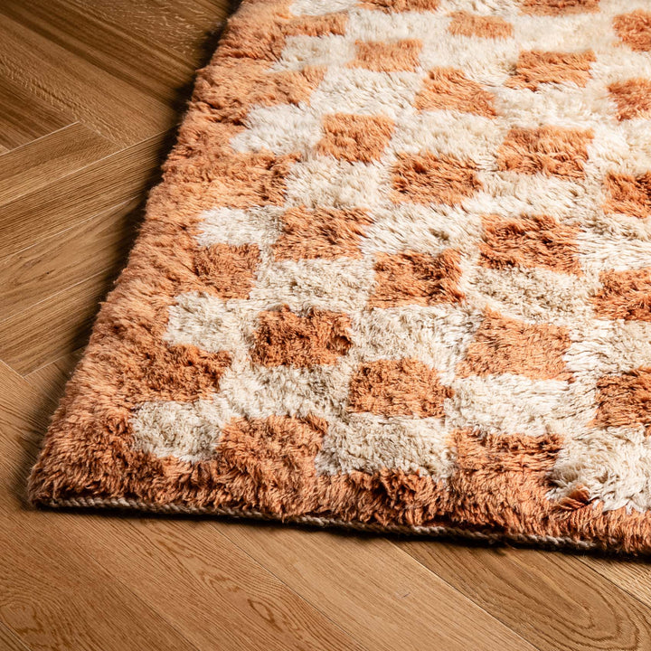 Checkered Moroccan wool rug, handmade Beni Mrirt carpet with shag finish, blending traditional Berber and modern design. Rugs from Morocco.