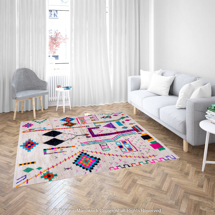 Colorful Azilal Moroccan rug, handwoven Berber wool art, vibrant traditional motifs on creamy wool background in a modern living room.