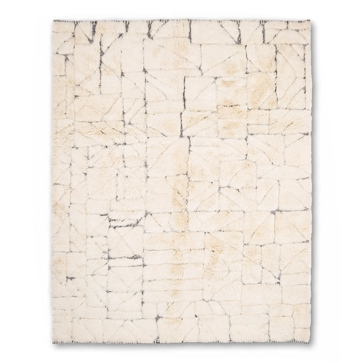 Cream Moroccan wool rug with abstract grid lines, handcrafted by artisans, showcasing traditional Berber motifs. Perfect area rug for sale.