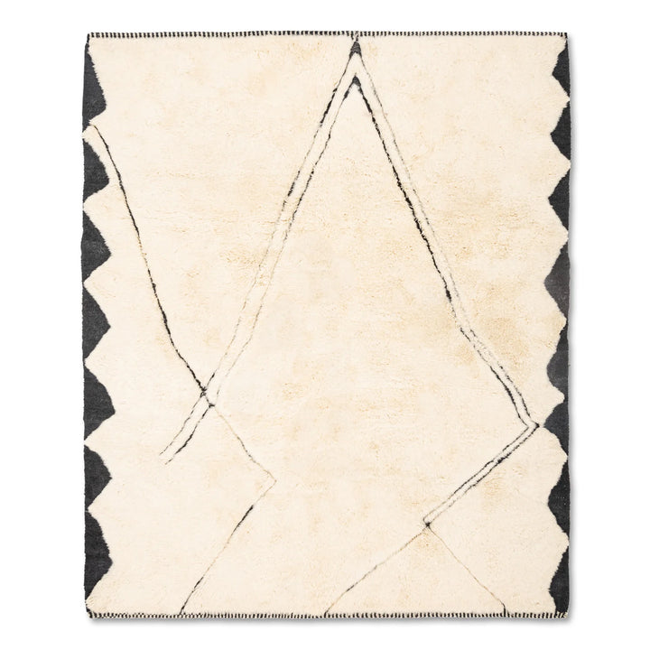 Cream Moroccan wool rug with black mountain lines, handmade and perfect for modern or rustic interiors.