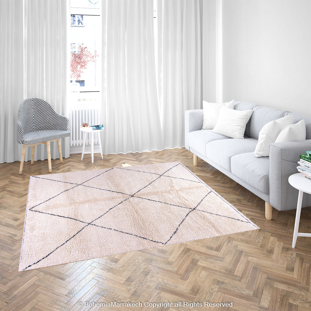 Handmade wool black and white diamond Moroccan rug in modern living room, minimalist design.