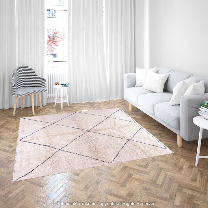 Handmade wool black and white diamond Moroccan rug in modern living room, minimalist design.