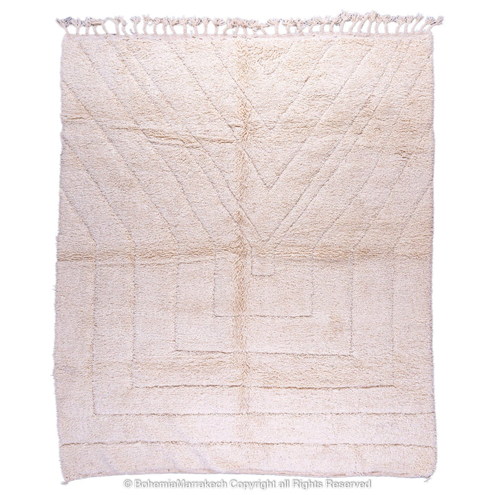 Cream Moroccan Berber wool rug with minimalist geometric pattern, handmade in the Atlas Mountains. Ideal for serene, modern interiors.
