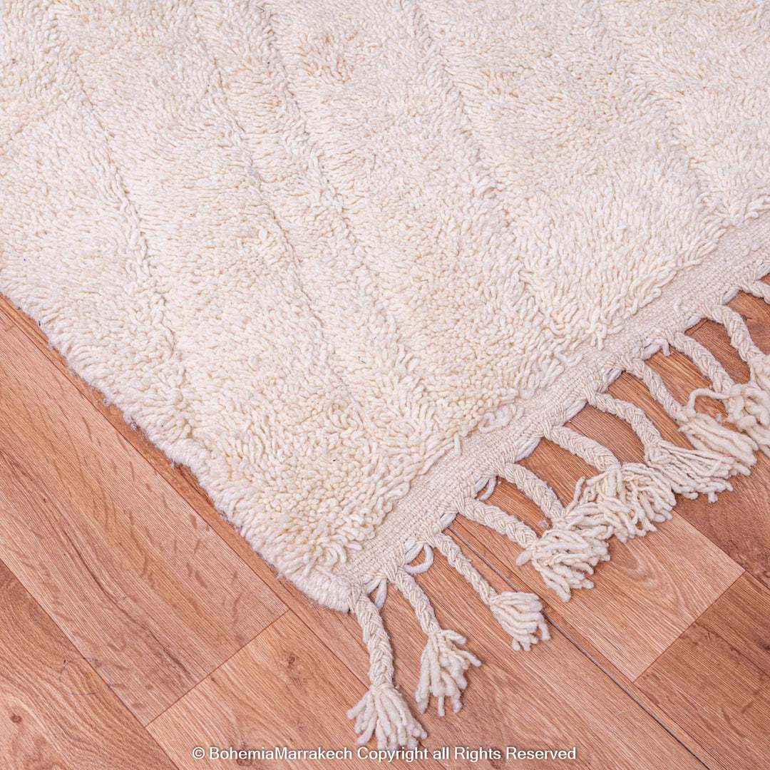 Cream Moroccan Berber rug with geometric lines, handmade wool area rug, perfect for serene interiors.