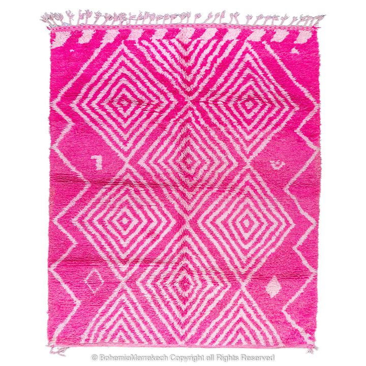 Pink Moroccan Berber diamond motif wool rug with geometric patterns, handmade by artisans, 8x10 size. Vibrant and cozy.