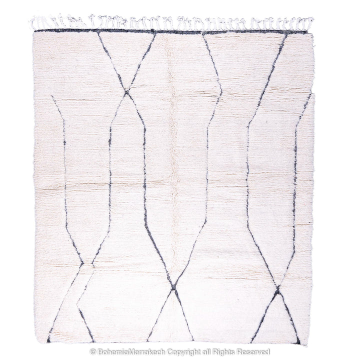 White Moroccan Beni Ourain wool rug with black geometric lines, ideal for modern interiors; natural Moroccan Berber carpet.
