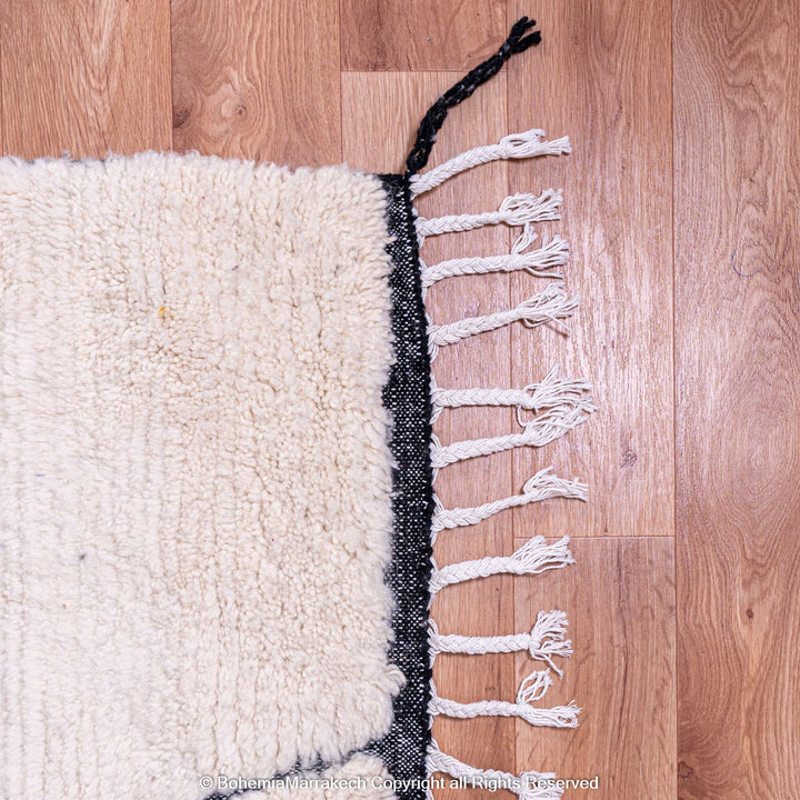 White Moroccan rug with black lines, Beni Ourain style, handmade wool, perfect for modern interiors, Moroccan rugs for sale