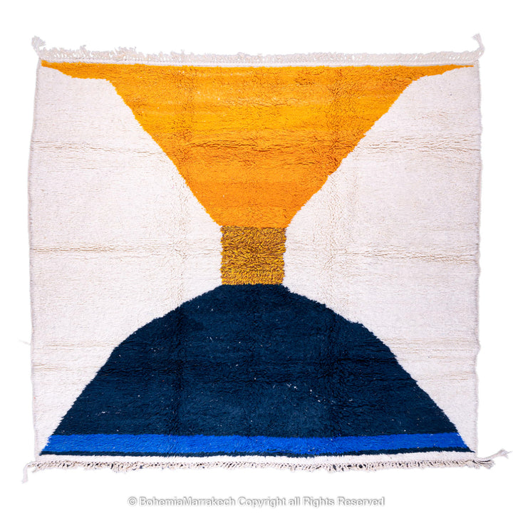 Modern Moroccan wool rug with yellow and navy abstract hourglass design, handmade Moroccan berber rug.