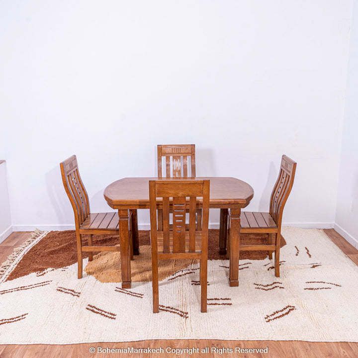 Dining set on a Modern Moroccan Rug featuring abstract brown and beige design, handcrafted by Berber artisans from natural wool.
