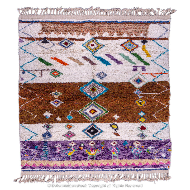Colorful Moroccan wool rug with tribal diamonds and Berber motifs, featuring vibrant blue, orange, and purple tones. Handmade carpet.