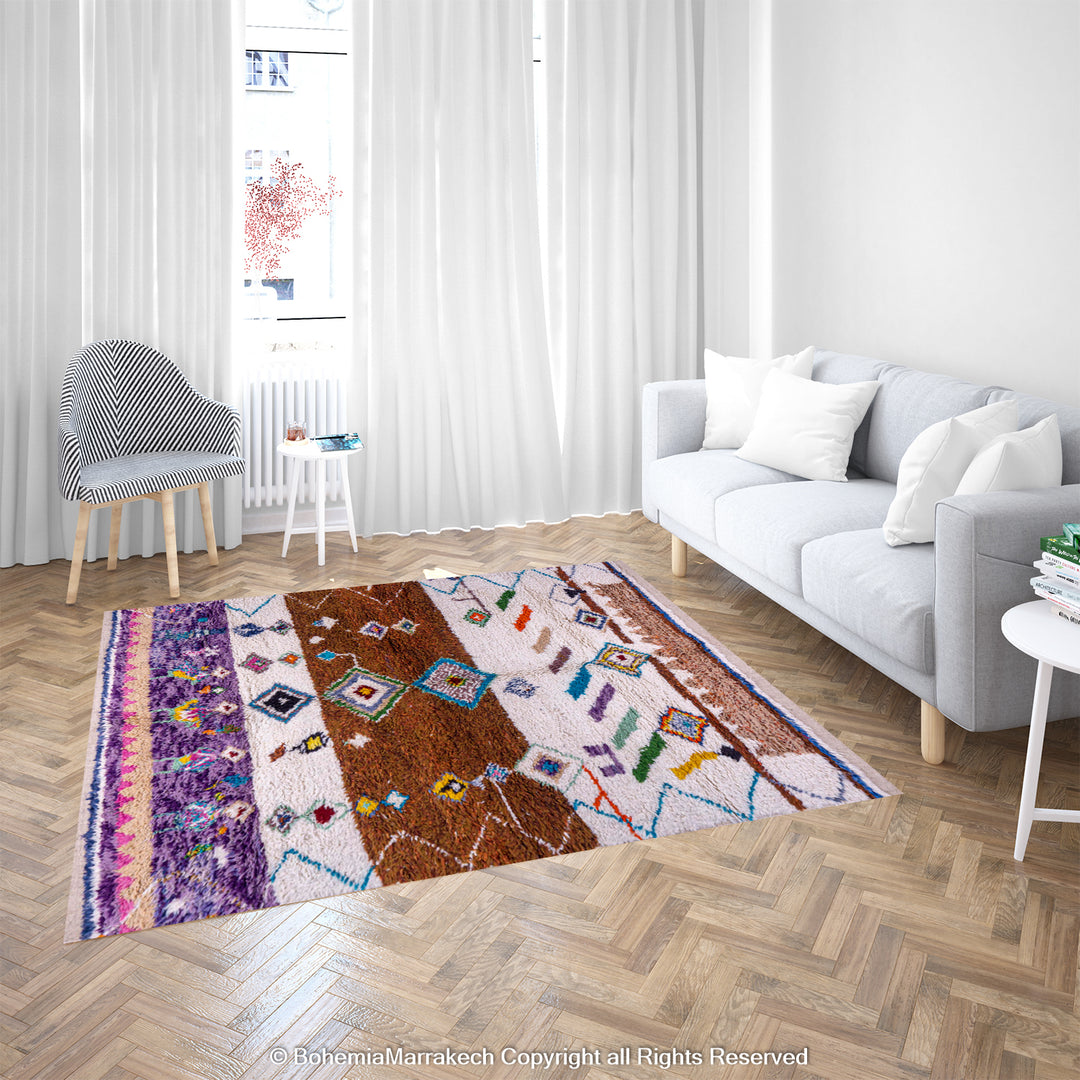 Colorful Moroccan wool rug in living room, featuring tribal diamonds and rich hues, showcasing Berber craftsmanship.
