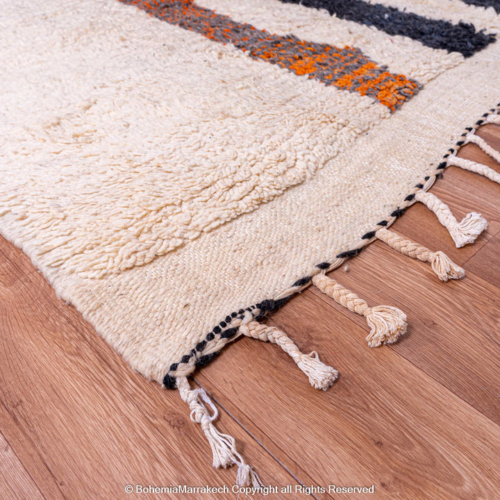 Striped Abstract Moroccan Berber Rug - Handmade Wool Carpet Close-up with Black, Orange Stripes and Creamy Texture