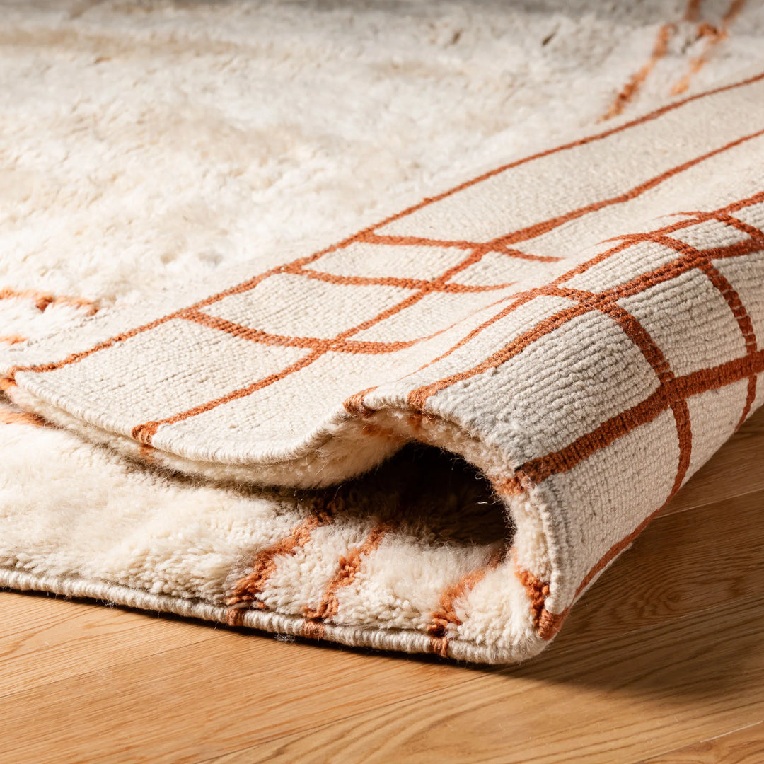 Custom Beni Mrirt Moroccan wool rug with grid pattern, showcasing artisanal craftsmanship in a modern design.