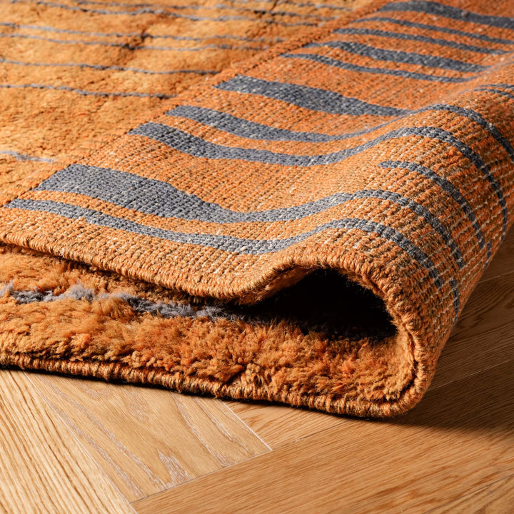 Custom Beni Mrirt Moroccan wool rug with vertical lines, handwoven in Atlas Mountains.