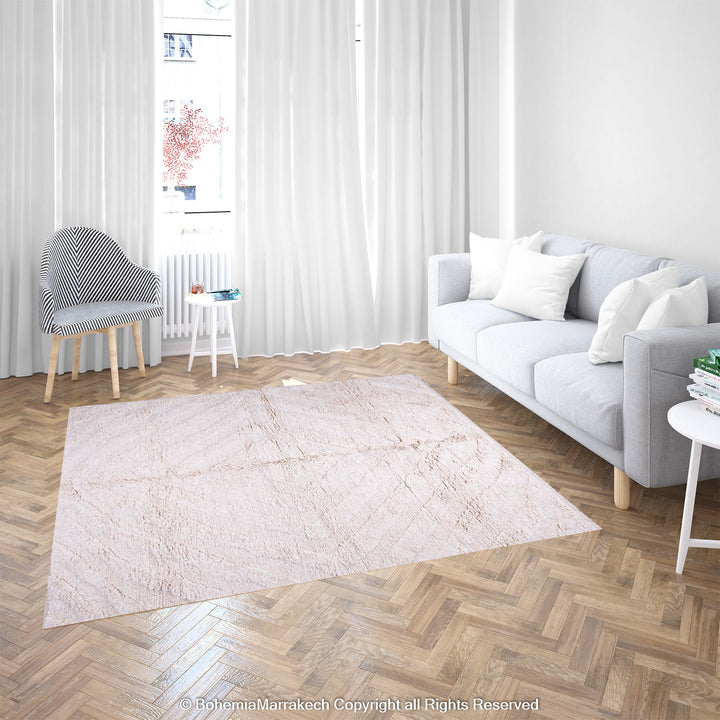 Cream Moroccan Beni Ourain rug with soft tone-on-tone chevron design