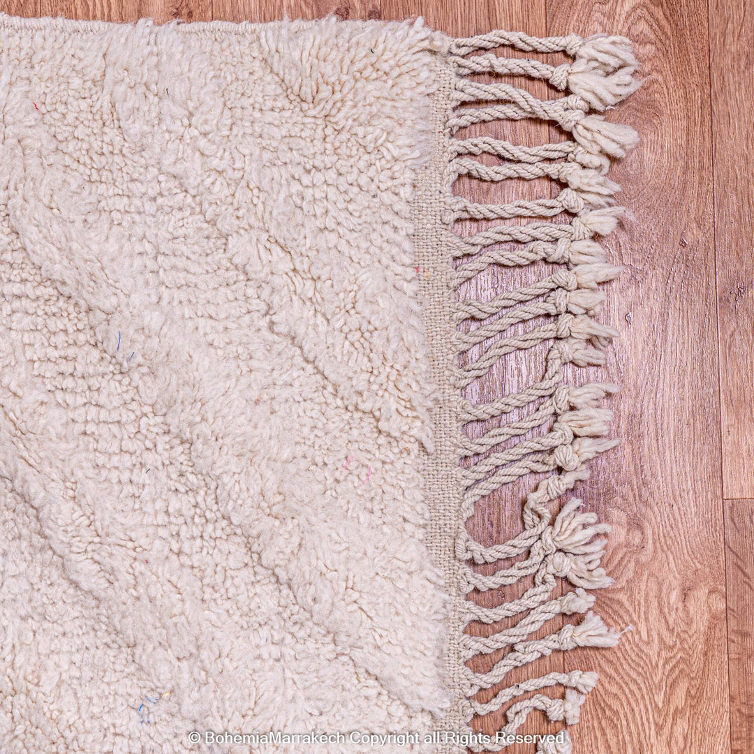 Cream Moroccan Beni Ourain rug with soft tone-on-tone chevron design