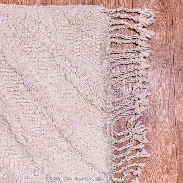 Cream Moroccan Beni Ourain rug with soft tone-on-tone chevron design