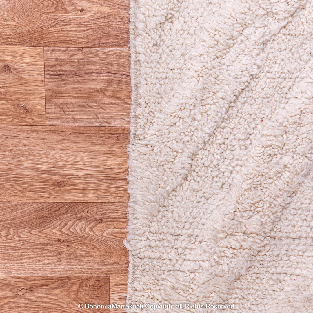 Cream Moroccan Beni Ourain rug with soft tone-on-tone chevron design