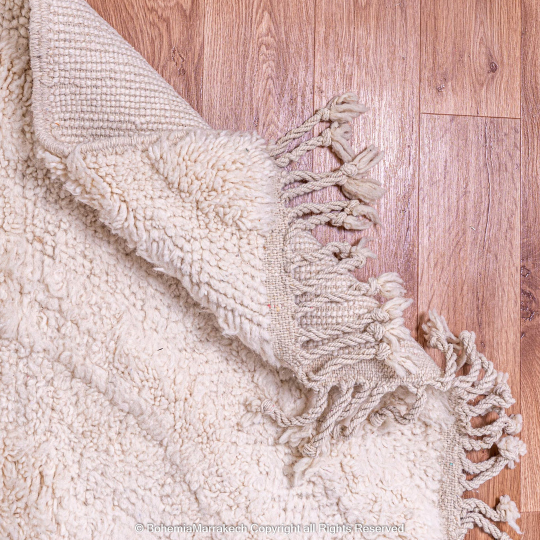Cream Moroccan Beni Ourain rug with soft tone-on-tone chevron design