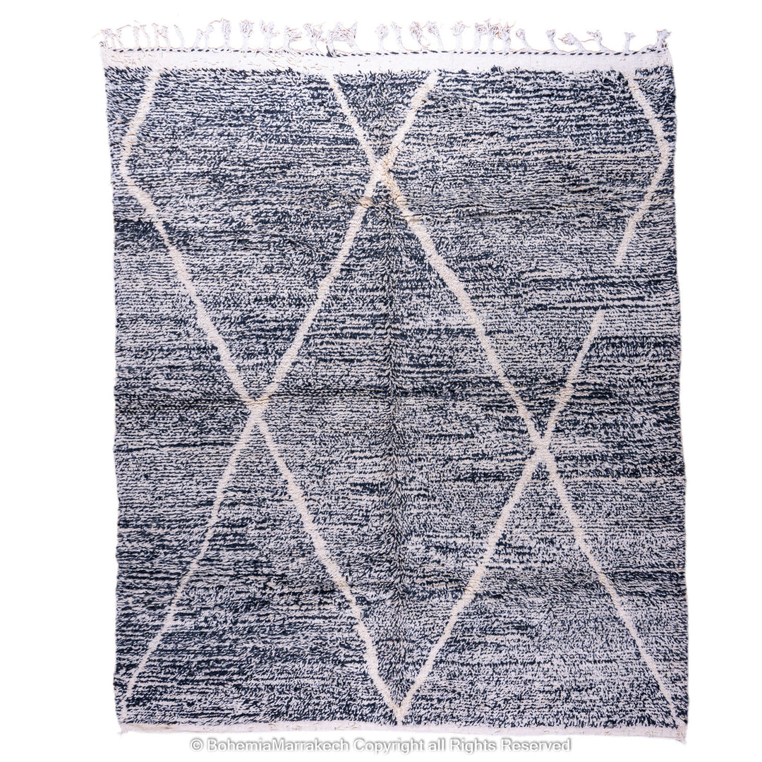 Handmade black and white Moroccan Beni Ourain rug with diamond patterns