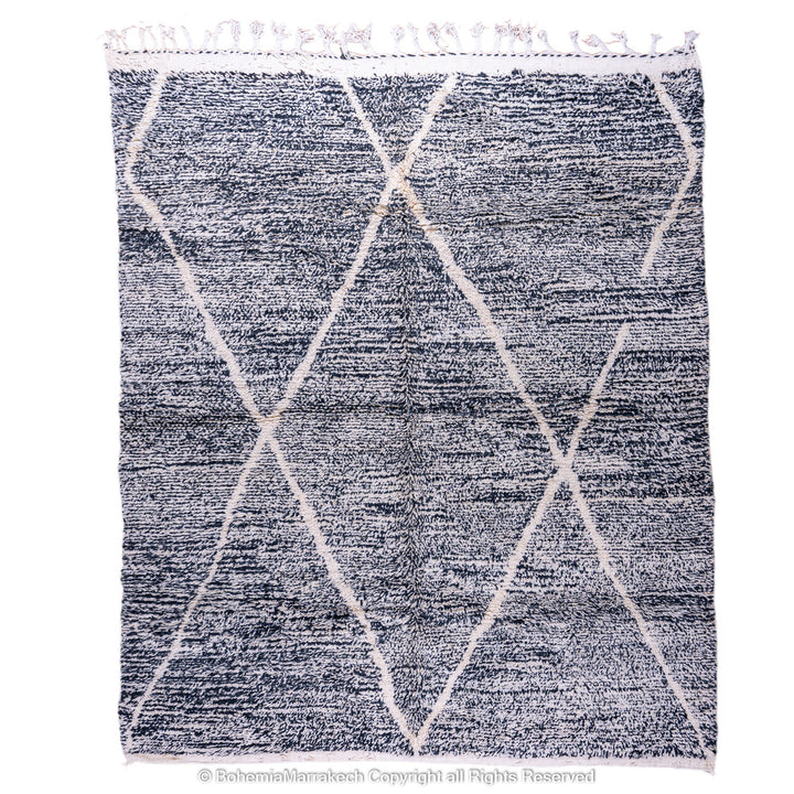 Handmade black and white Moroccan Beni Ourain rug with diamond patterns