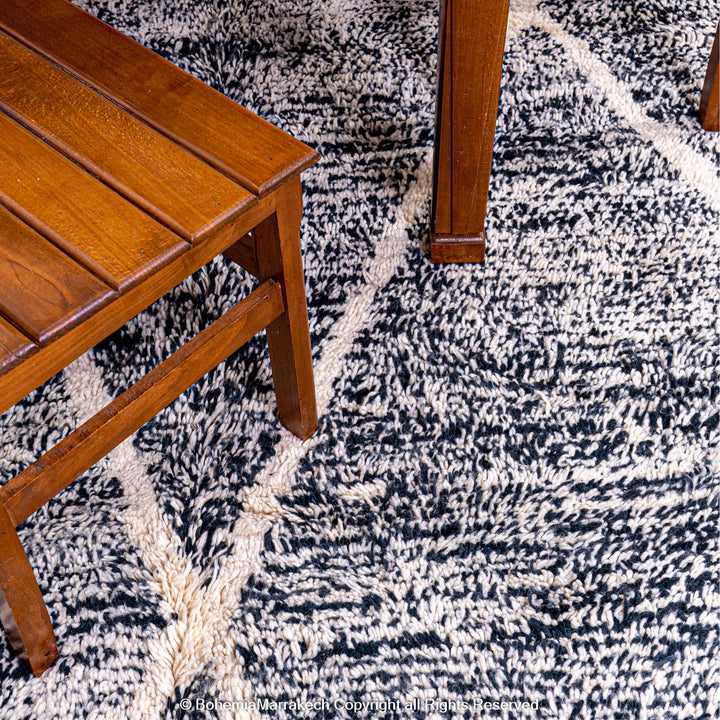 Handmade black and white Moroccan Beni Ourain rug with diamond patterns
