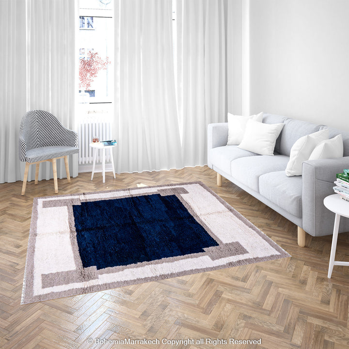 Bold navy blue Moroccan rug with beige and cream geometric border – Beni Ourain wool