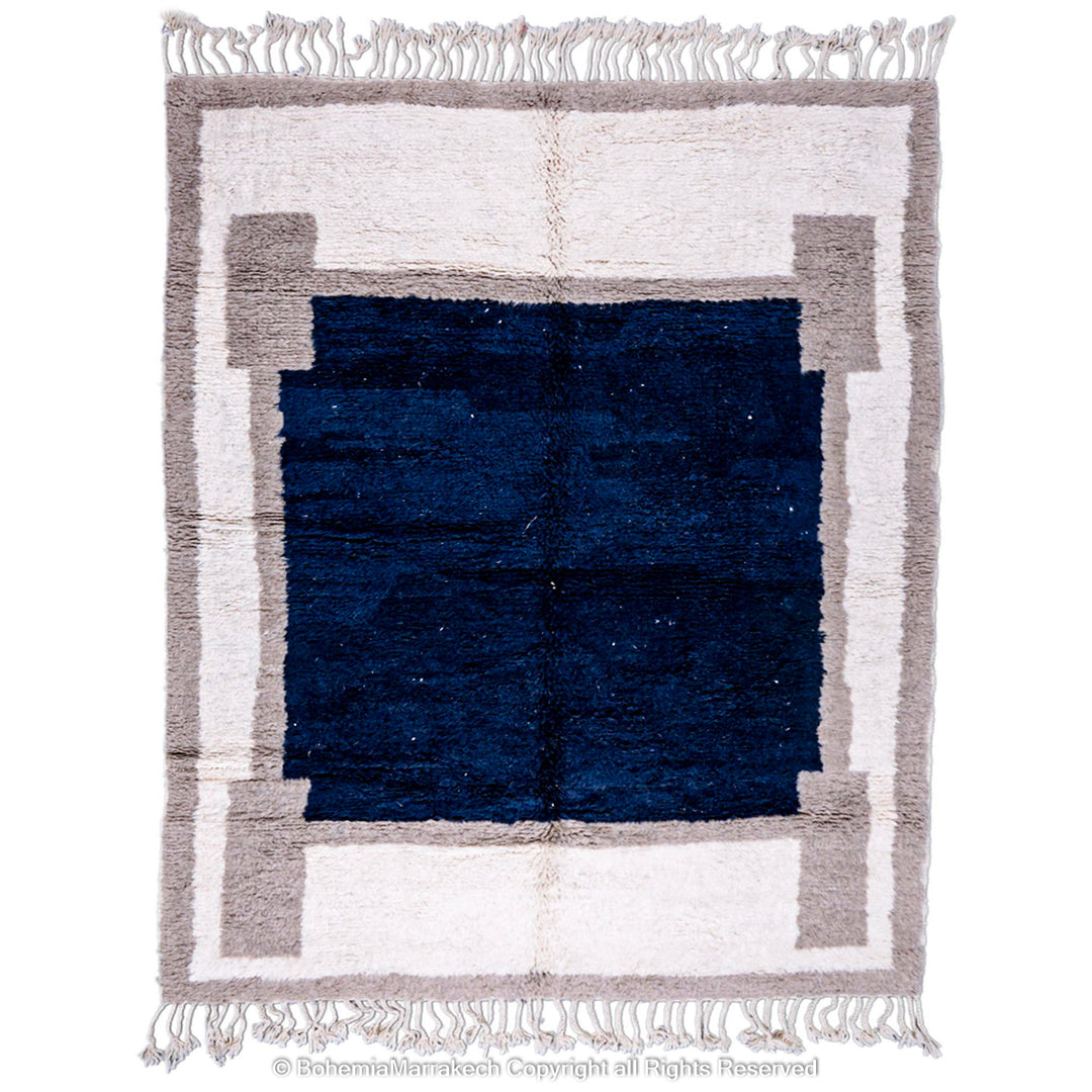 Bold navy blue Moroccan rug with beige and cream geometric border – Beni Ourain wool