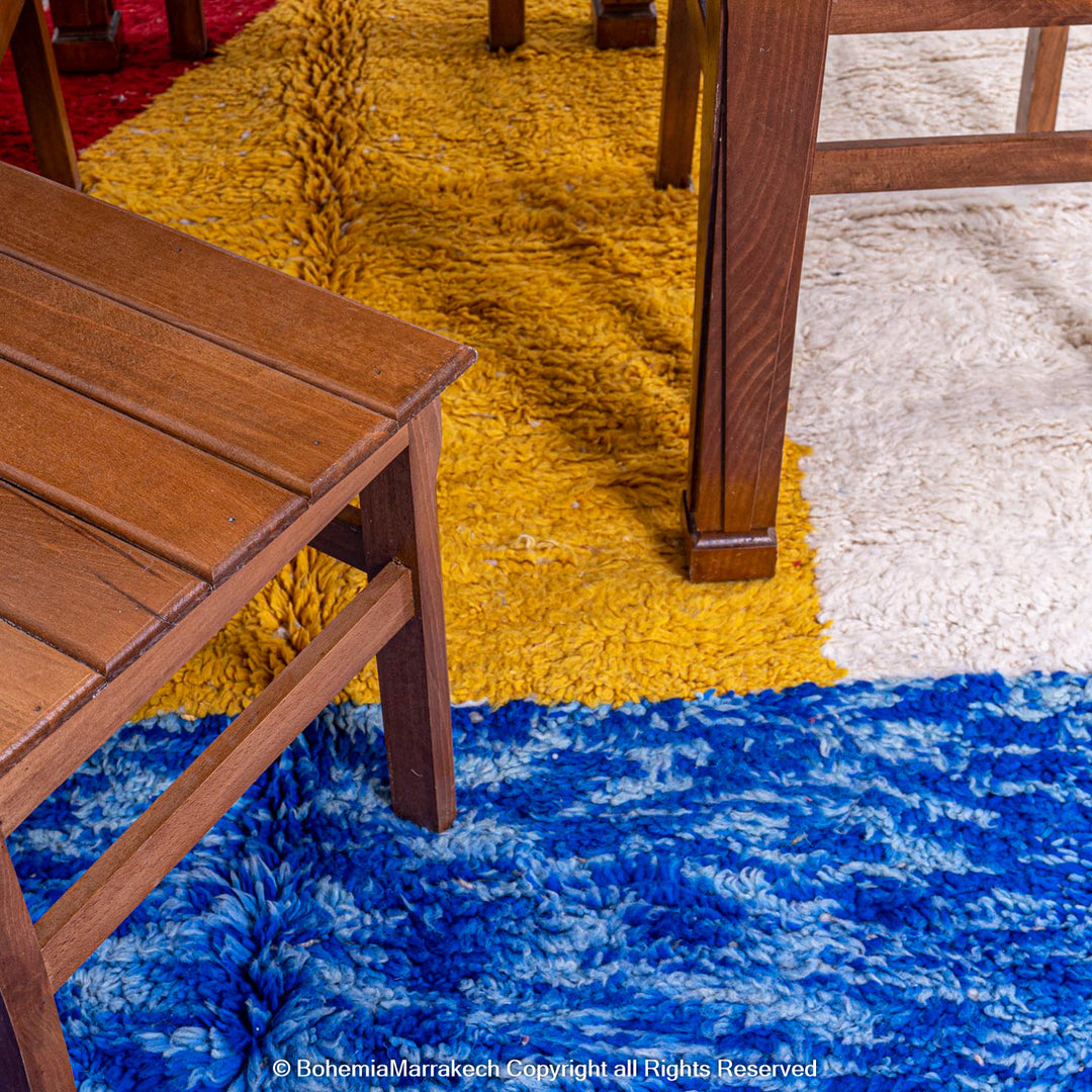 Modern Moroccan wool rug with abstract shapes in yellow, red, blue, and black – Beni Ourain handmade carpet