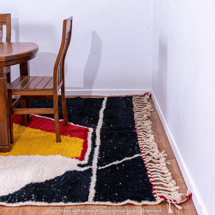 Modern Moroccan wool rug with abstract shapes in yellow, red, blue, and black – Beni Ourain handmade carpet